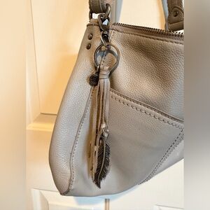 The Sak Taupe Leather Lucia Crossbody Bag. GUC